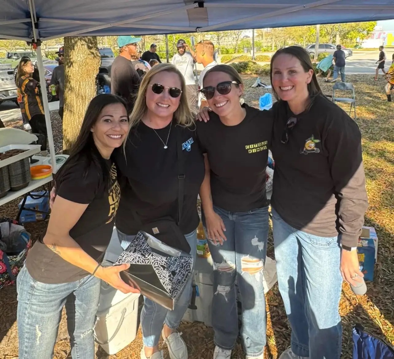 Team Moms enjoying the tailgate festivities